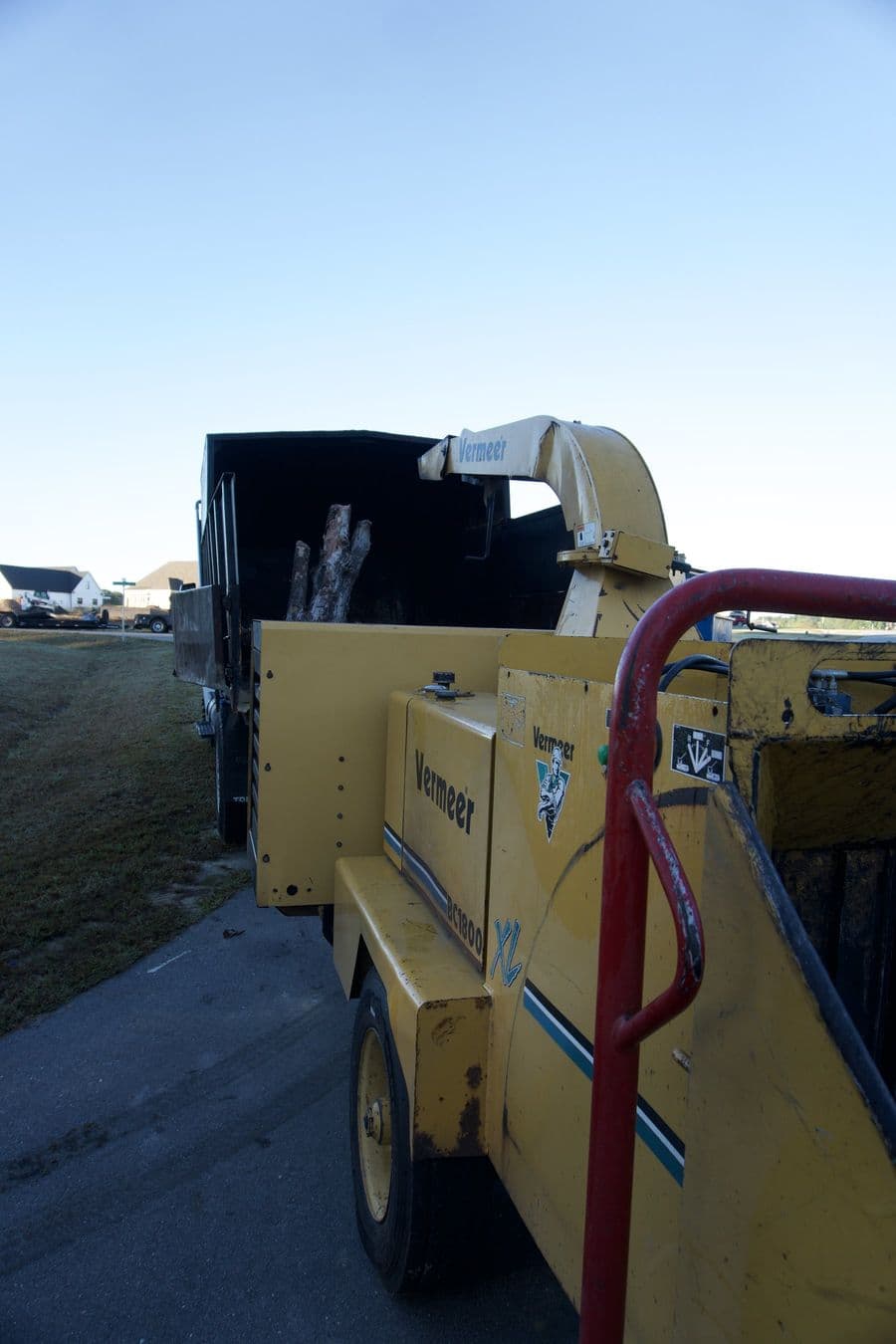 Vermeer wood chipper hitched behind the Tree Works dump truck